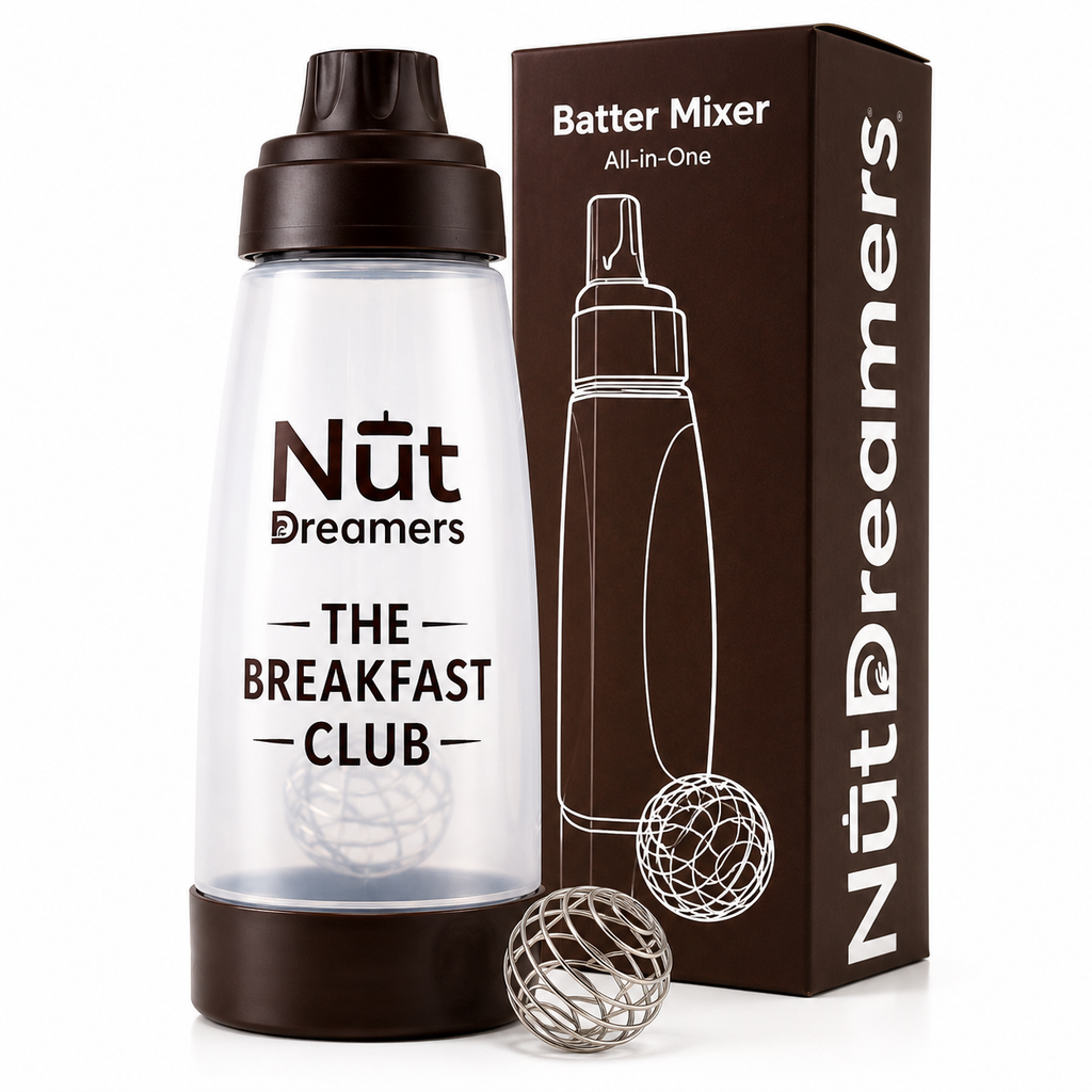 Nut Dreamers batter mixer with packaging and a metal ball on a white background