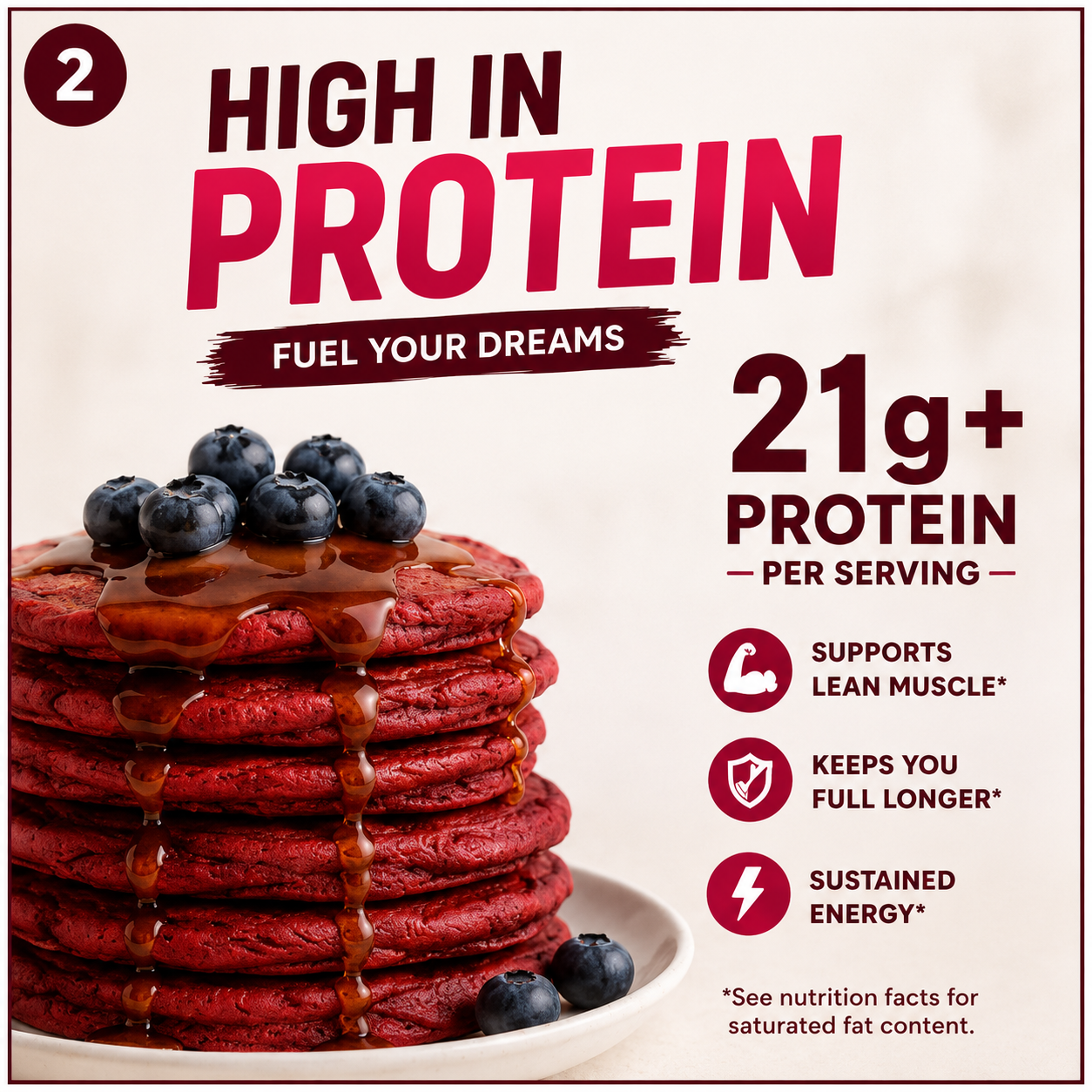 Stack of red protein pancakes with blueberries and syrup, labeled high in protein on a beige background.