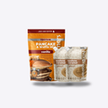 Vanilla Protein pancake and waffle mix by Nut Dreamers with their Cashew caramel Spread on a white background.